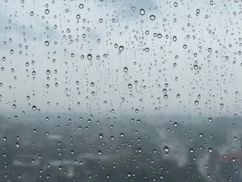 Raindrops,Captured,From,Apartment,During,The,Rain